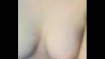 Beautiful Asian showing tits on webcam